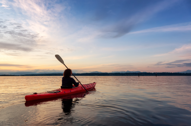 Kayaking at twilight in Oakland Bay