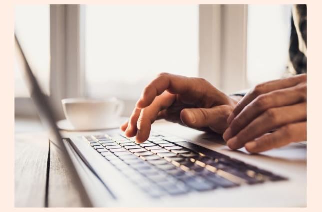someone typing on a computer