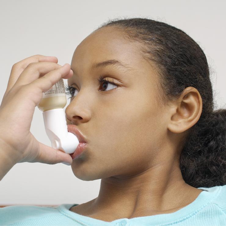 NJ_Asthma_Girl_w_Inhaler_Emily Scott