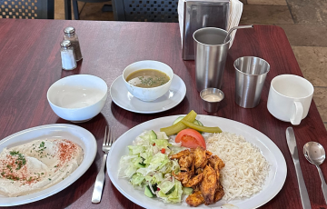 Before and after pictures showing a disposable table setting at a restaurant replaced with washable, reusable items
