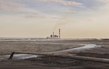photo: coal ash pouring through a pipe / shutterstock