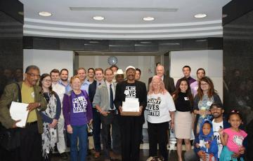Clean Water Activists and Michigan Faith in Action deliver letters to State House lawmakers and a sign on letter to Gov. Snyder and Speaker Cotter