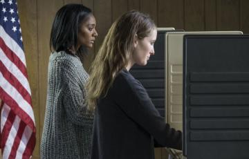 Two women voting. Photo credit: Burlingham / Shutterstock