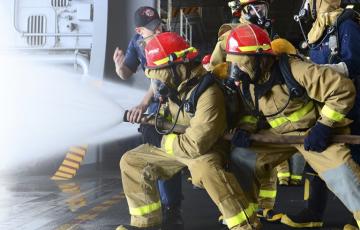 Firefighters using PFAS fire fighting foam