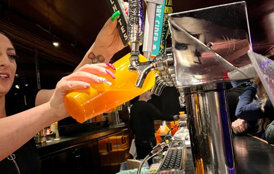 The Fillmore pouring drinks into reusable glasses