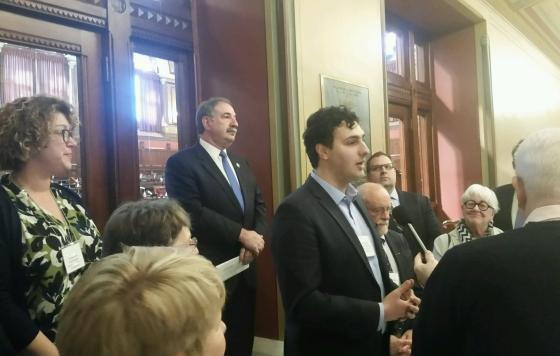 Rhode Island Rep. Aaron Regunberg, D-Providence, speaks at a press conference in Hartford, CT., about the importance of regional cooperation on carbon pricing legislation. Photo by Dave Gerraughty.
